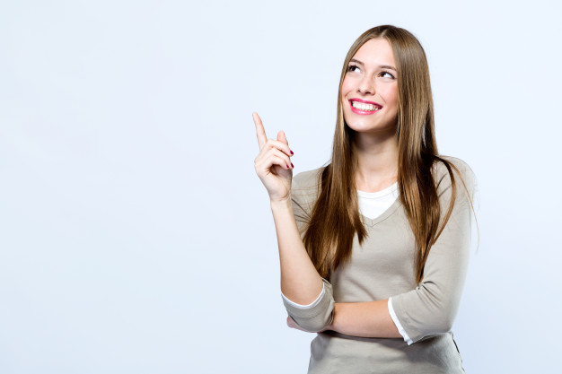 beautiful-young-woman-pointing-up-over-white-background_1301-7744.jpg
